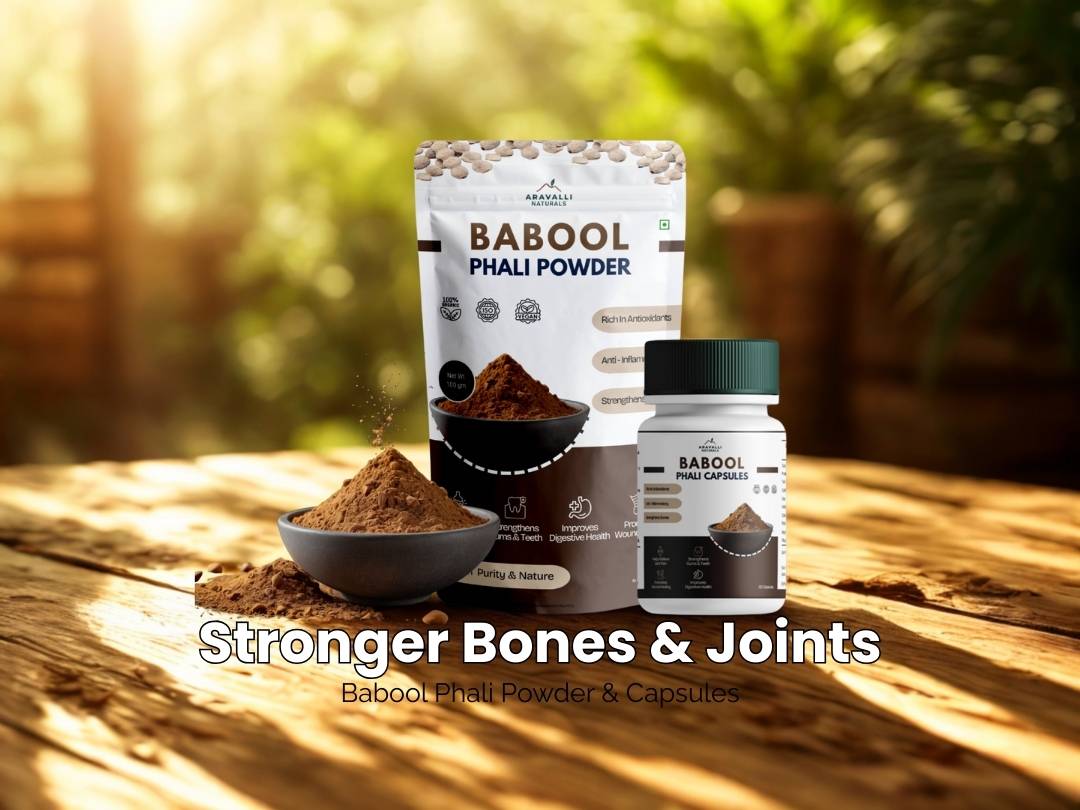 Babool Phalii Powder and Capsules packaging on a wooden surface with a natural background