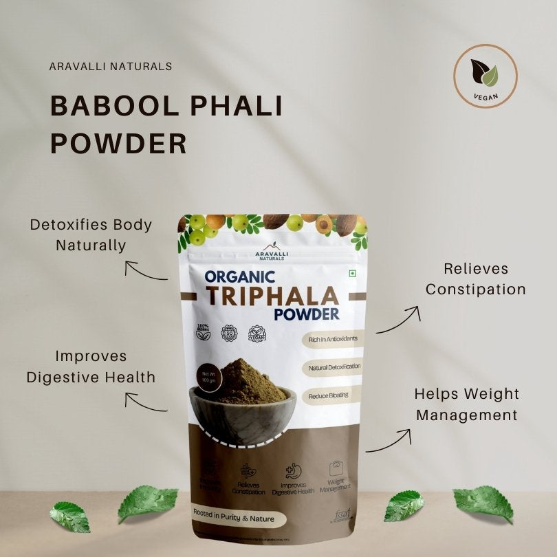Aravalli Naturals Organic Triphala Powder packaging with health benefits text on a beige background